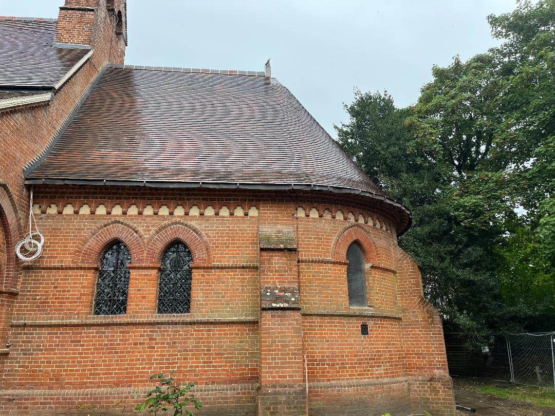 Side of church showing roofing tiles